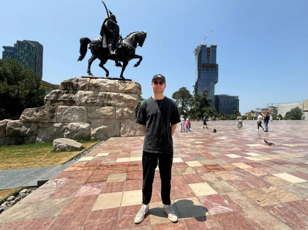 The author's boyfriend, Michael at the Skanderbeg Monument
