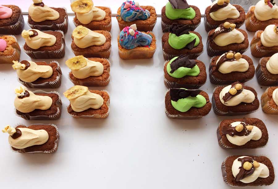 Different kinds of mini cakes in a pastry shop in London