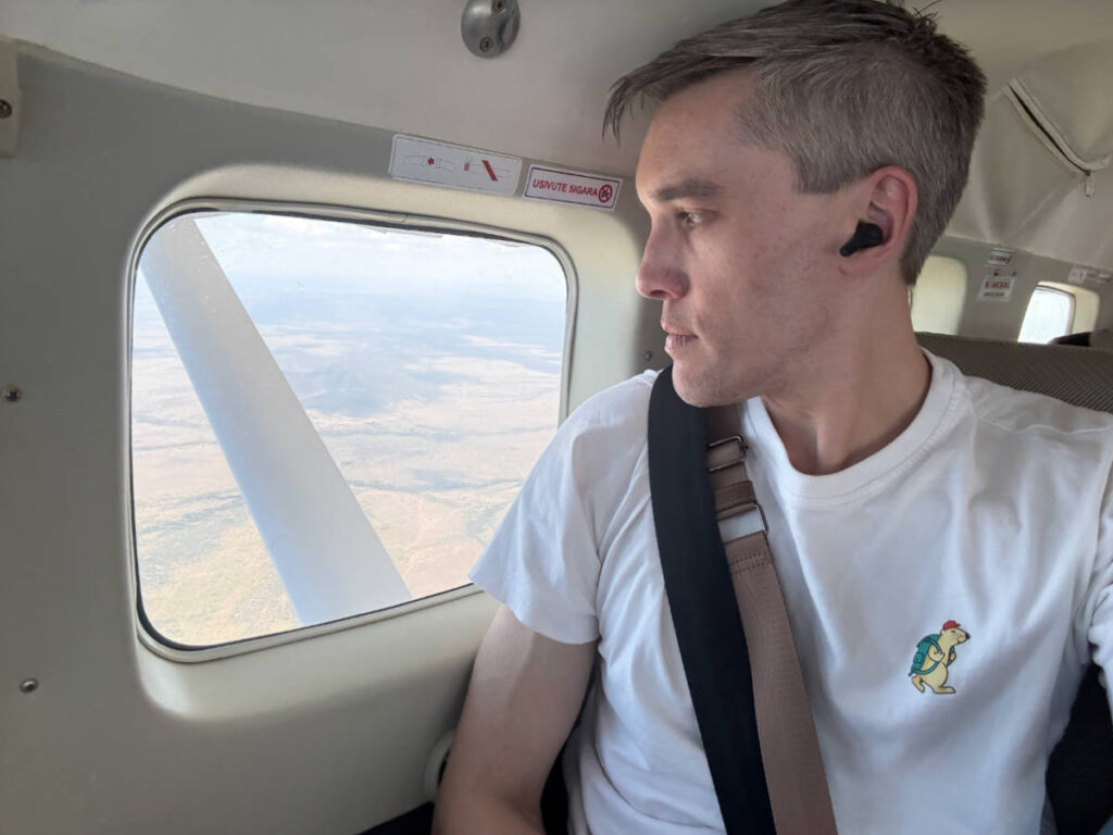 Travel Lemming founder, Nate Hake, enjoying the overlooking views on their return flight