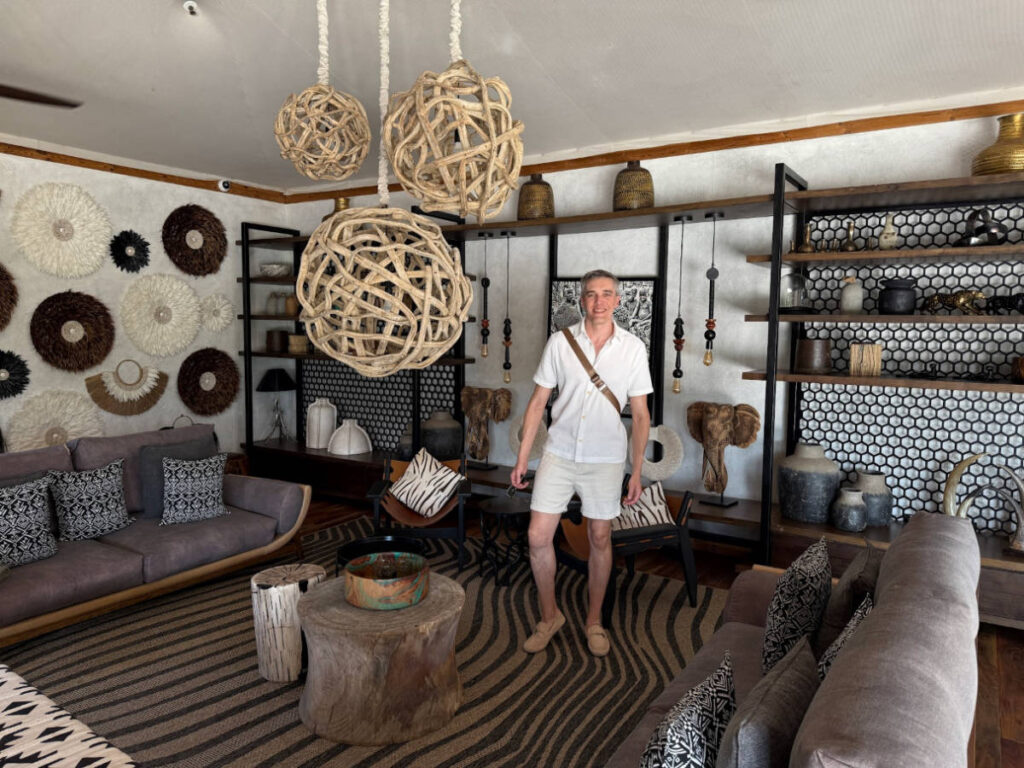 Travel Lemming founder Nate Hake, standing in the bar’s lounge area