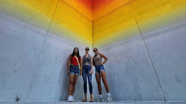 The author Niamh Hayes with her friends posing for a photo