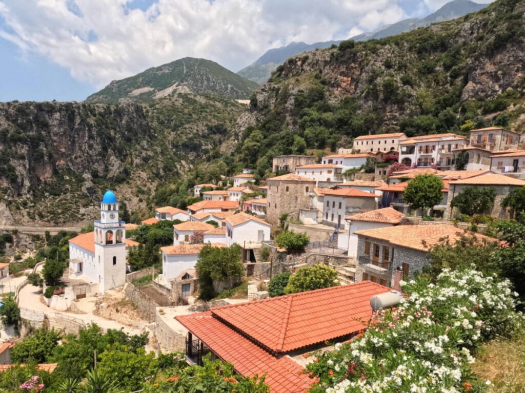 Overlooking view of the famous blue-domed church and the houses in Dhërmi