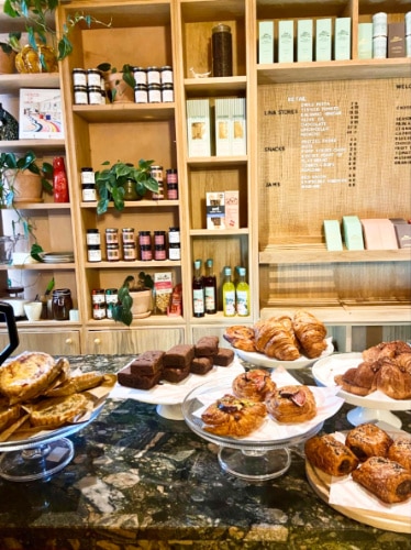 Variety of pastries displayed on the counter at Ember Locke