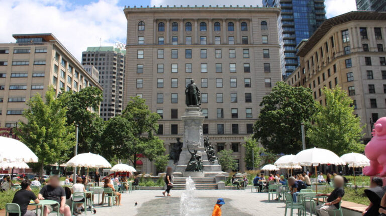 People at the Phillips Square Park in the morning