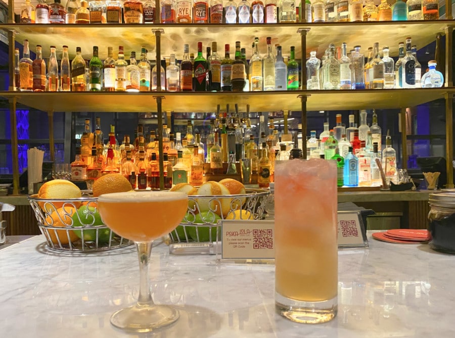 Two cocktails at Poka Lola bar in Denver Dairy Block