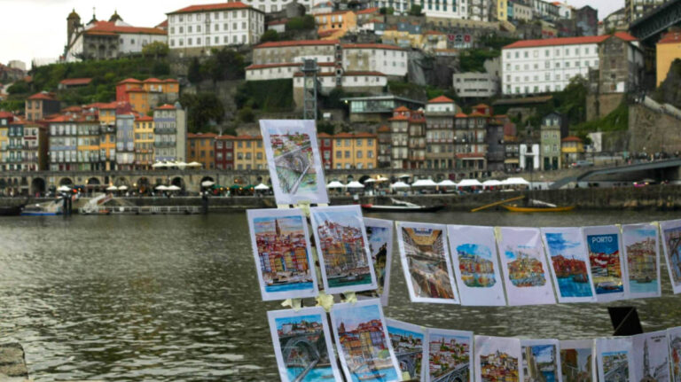 The display of the mini hand paintings at the waterfront with Porto views