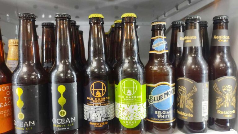Several bottles of Puerto Rico beer brands in a cooler