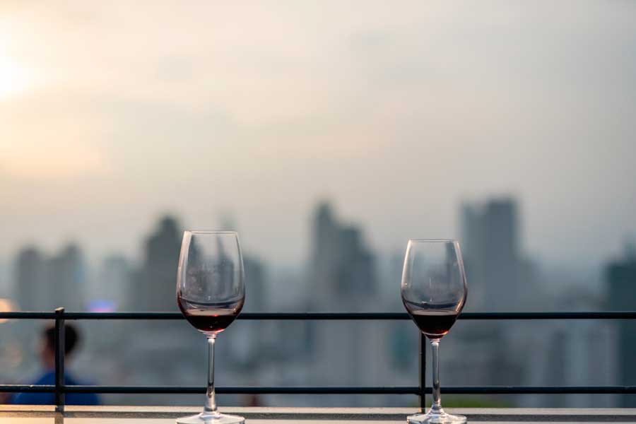 Glasses of wine on a rooftop bar in Los Angeles