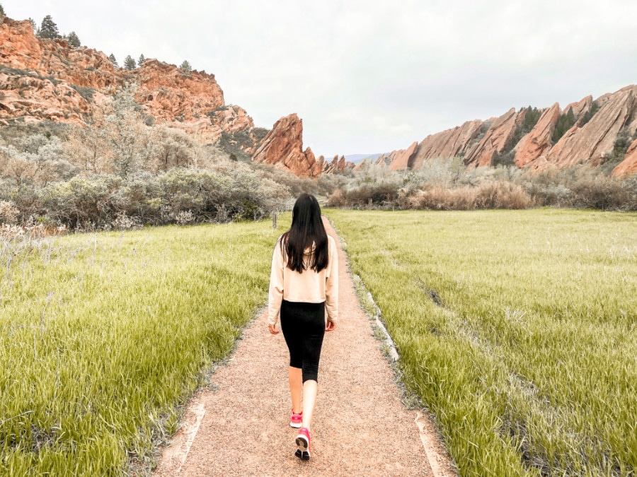 Clara walking on the trails in Roxborough State Park