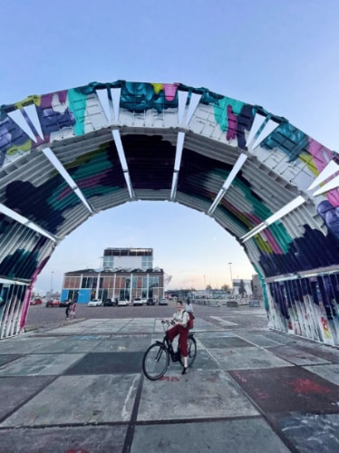 Ruthie Walters cycling in Amsterdam, the Netherlands
