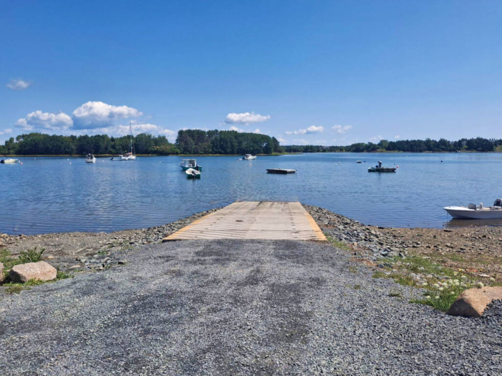Scenic view of the clear blue sky over the clear water at Sawpit Park