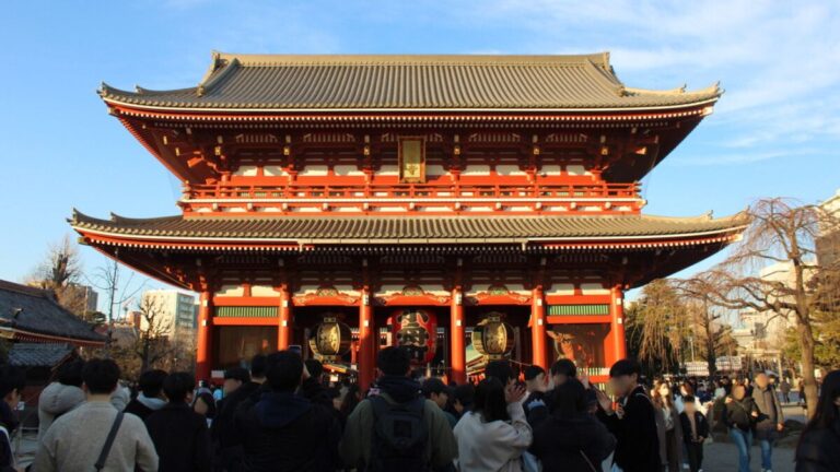 Visitors entering Senso-Ji Temple in Tokyo