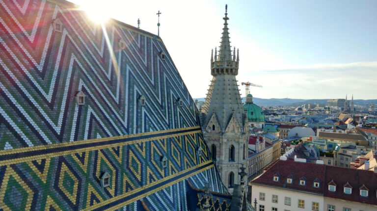 Sun shining on roof of St Stephen’s Cathedral in Vienna
