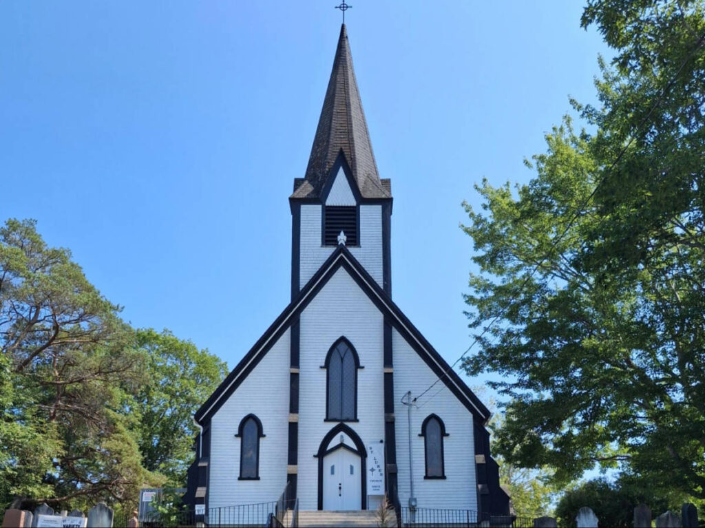 Facade of the St. Luke's Anglican Church surrounded by greenery