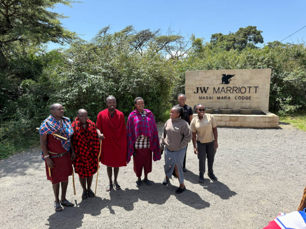 The staff and Masai guards greeting outside the JW Marriott Masai Mara