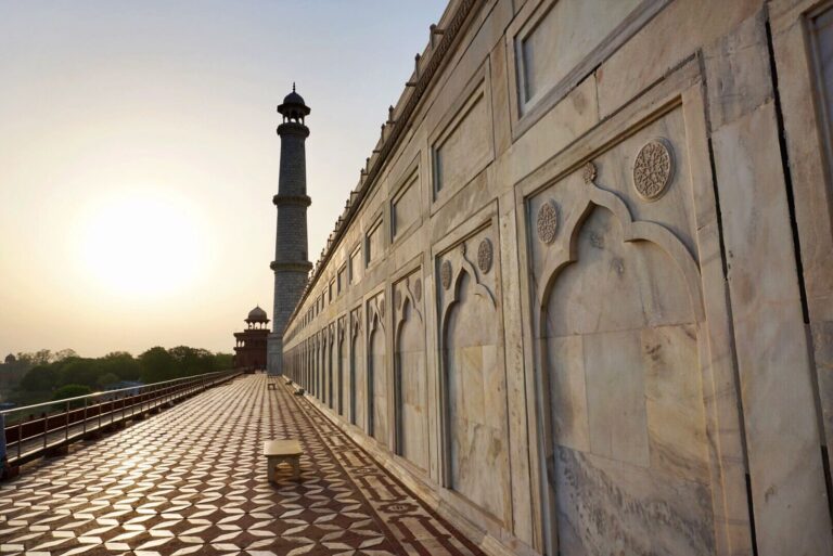 Sun sets behind the iconic Taj Mahal