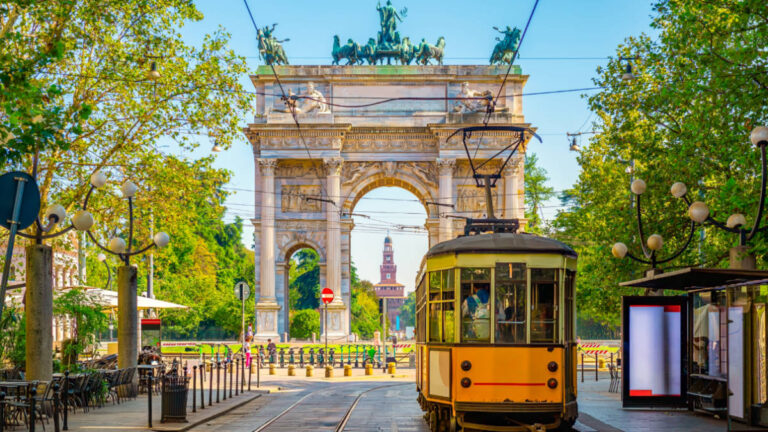 View of the Arco della Pace with the yellow tram