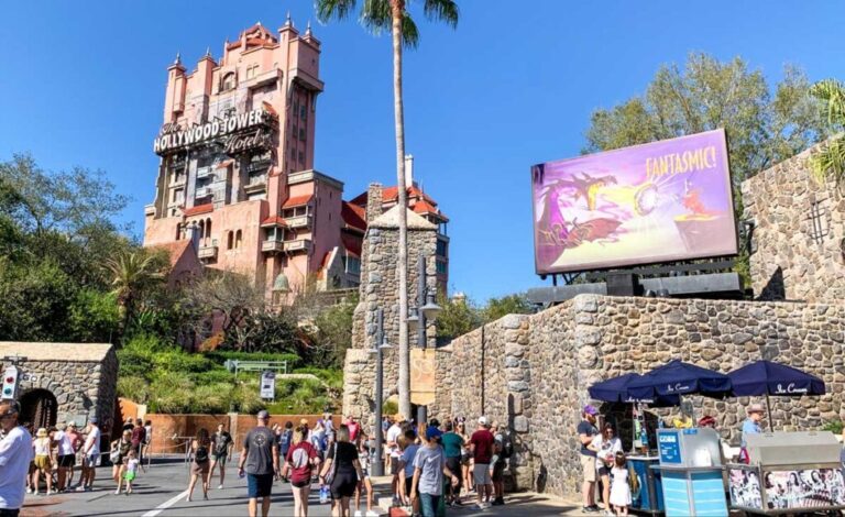 People in Hollywood Studios and the Tower of Terror from afar