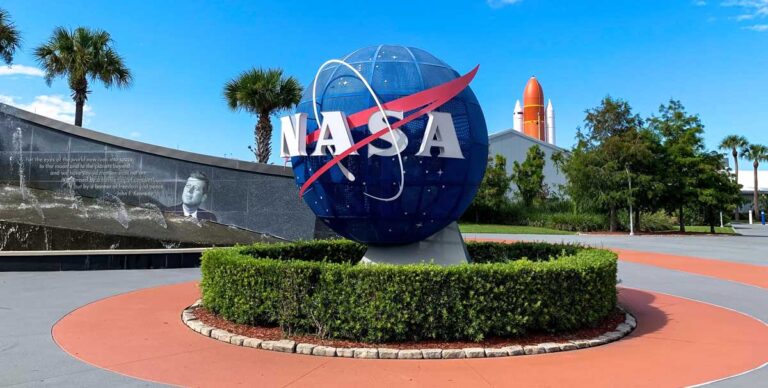 The NASA logo on a sphere like earth in the parking lot of the Kennedy Space Center Visitors Complex