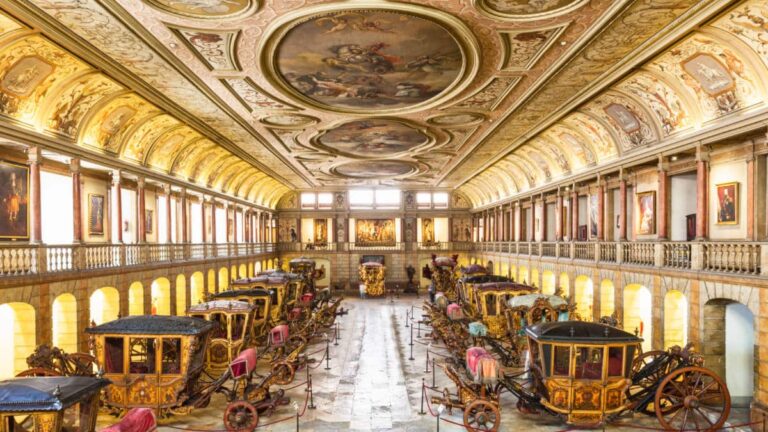 View of the golden interior and displays at the National Coach Museum