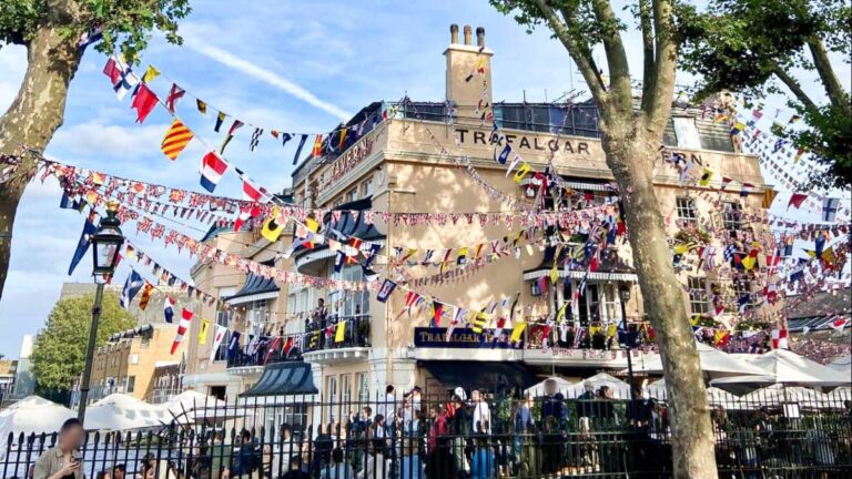 The iconic flags at the entrance of Trafalgar Tavern
