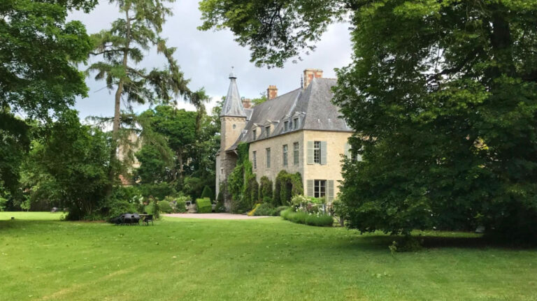 Picturesque Château de Saint Paterne, nestled amidst lush greenery