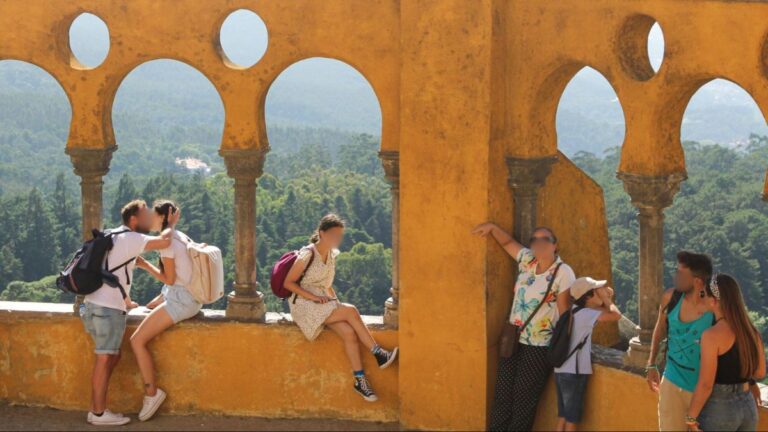 Tourists appreciating the views from Pena Palace in Sintra