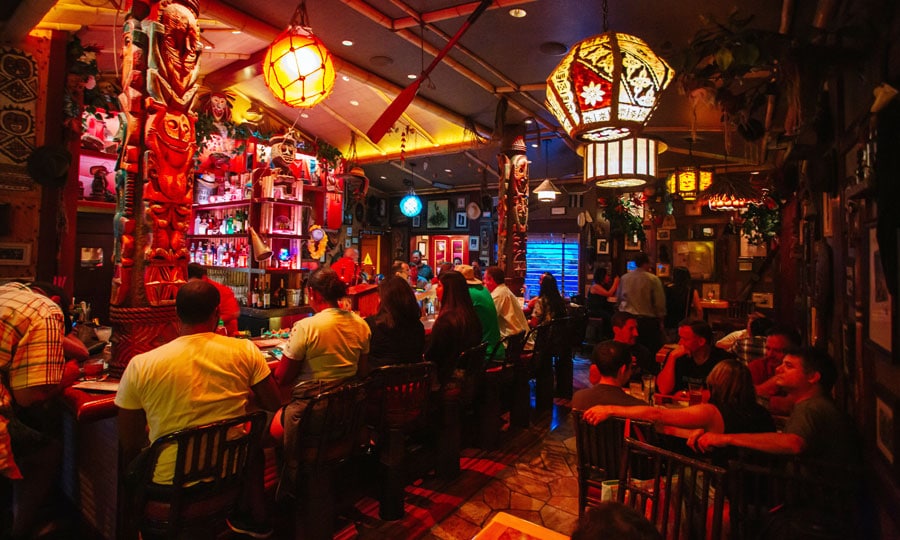 People having fun inside theTrader Sam’s Grog Grotto