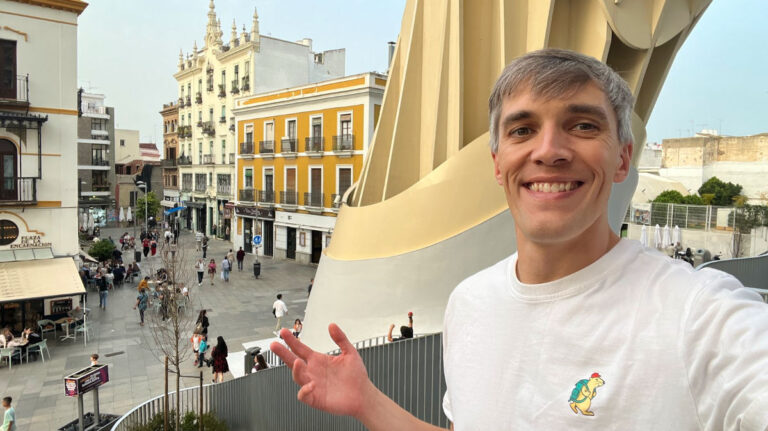 Travel Lemming Author Nate selfie in a street in Seville, Spain