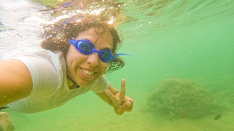 Travel Lemming author Vanessa taking a selfie underwater in Playa Peña
