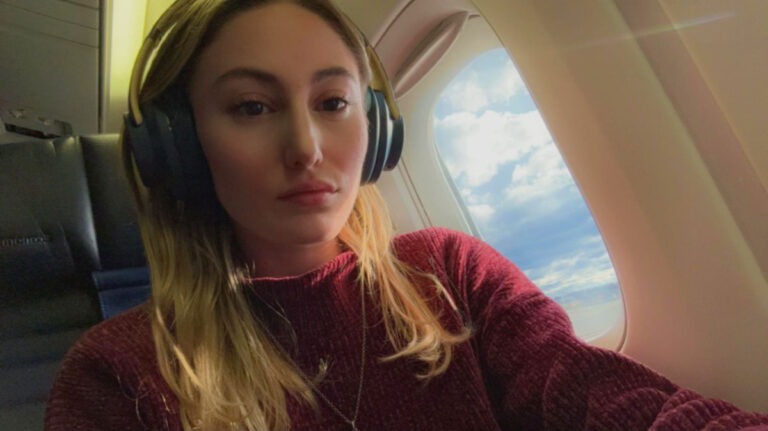 Travel Lemming Writer, Sky Ariella, as her flight to England takes off