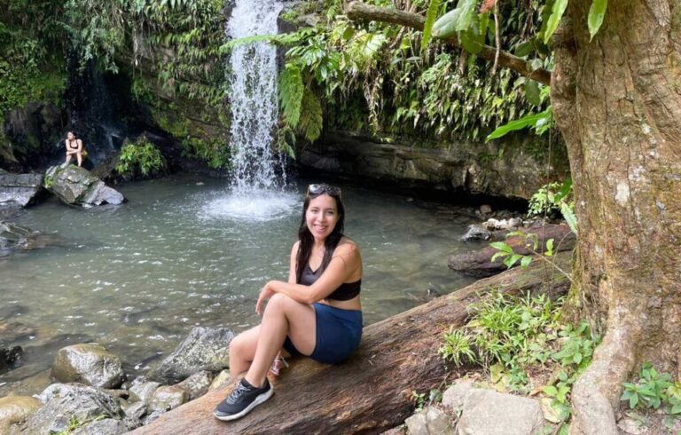 The author, Vanessa Ramos with a waterfall behind her
