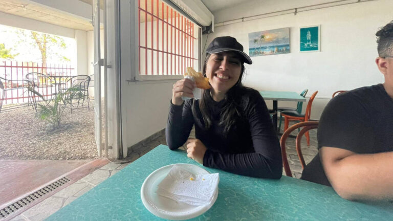The author Vanessa Ramos eating Puerto Rican local food
