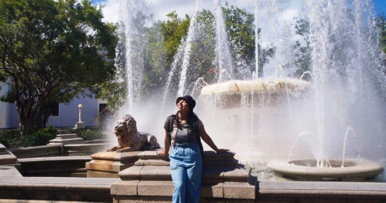 The author Vanessa Ramos in front of the fountain