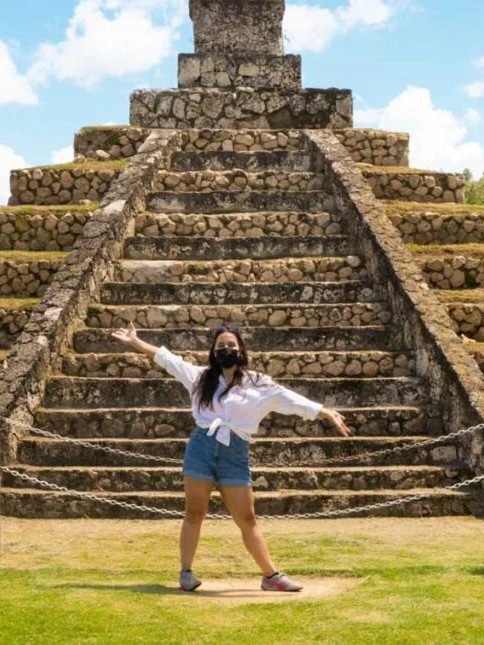 Vanessa Ramos in front of a pyramid in Aguada