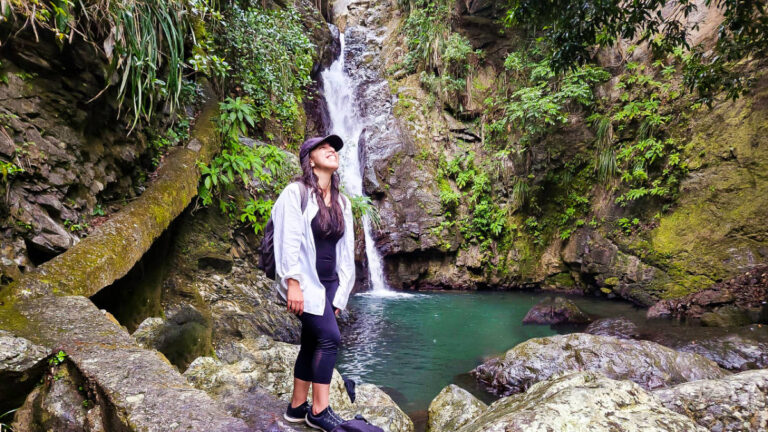 The author Vanessa Ramos, posing in front of the La Soplaera waterfalls