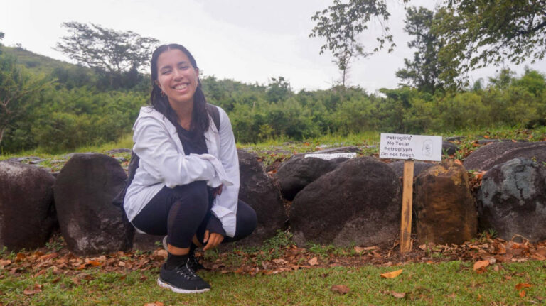 The author Vanessa Ramos smiling for a photo in Tibes
