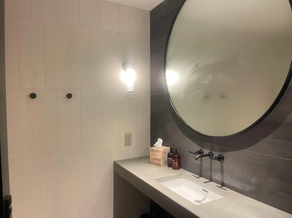 View of the interior of the walk-in shower at AutoCamp