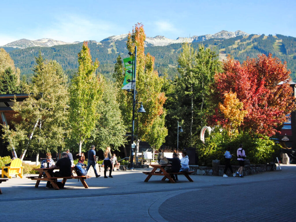 The people enjoying the fall foliage around the Whistler Village