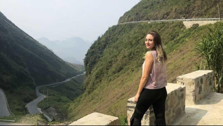 The author posing for a photo during a stop over on her motorbike trip in Vietnam